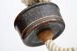 Unknown artist's ceiling lamp, detailed view of top ceramic piece with rope