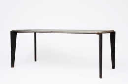 Jean Prouv&eacute;'s aluminum dining table, full diagonal view