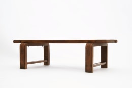 Jacques Adnet's coffee table/bench diagonal view from eye-level