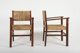Francis Jourdain (1876 - 1958) Pair of armchairs, 1930 _View of both chairs. One facing perpendicular to the other.