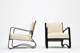 Jacques Adnet pair of armchairs side and front view