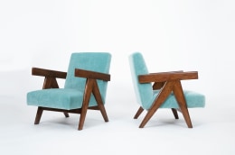 Pierre Jeanneret's Pair of &quot;Upholstered Easy&quot; lounge chairs, full side and front diagonal views