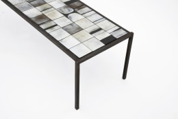 Mado Jolain's ceramic coffee table detailed view of table top and metal frame