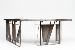 Modernist cement and iron desk, full view from eye-level