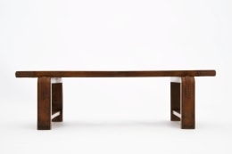 Jacques Adnet's coffee table/bench straight view from eye-level