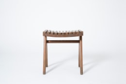 Pierre Jeanneret's pair of stools, full view of single stool from eye-level
