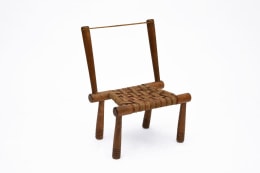 Gaston Castel's wooden chair diagonal view