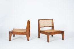 Image of Pierre Jeanneret, Pair of low chairs, c.1955-56 - front and 3/4 view