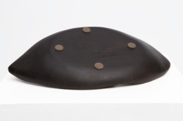 Alexandre Noll's black platter, view of signature on bottom