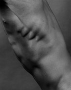 Male's torso, ribs protruding.