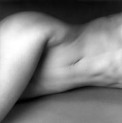 Reclining nude woman's torso.