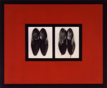 Two side-by-side pictures of black patent leather mens dress shoes with black borders and framed in a black frame with a red mat.