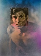 Portrait of white male in 3/4 view with spray painted background.