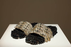 Amna Ilyas UNTITLED 1 (Slippers) 2009 Fibreglass, mobile key pads 3.5 x 11 x 10 in.