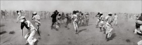 Raghu Rai DUST STORM CREATED BY A VIP HELICOPTER, RAJASTHAN 1975 Digital scan of photographic negative on archival paper 20 x 62 in.