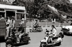 Raghu Rai Fighter Plane in City Traffic, Bangalore Edition of 10 2003 Digital scan of photographic negative on archival paper 18 x 27 in.
