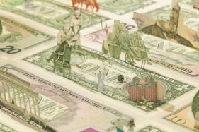 Abdullah M. I. Syed  Moneyscape VI: Playground of Alternative Economies (Detail)  2017  Hand-cut and assembled various uncirculated banknotes in custom light-box vitrine  22 x 22 x 10 in