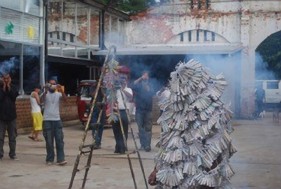 Bandu Manamperi Highly Explosive (Performance Still) 2010 C-print on archival paper 20 x 30 in.