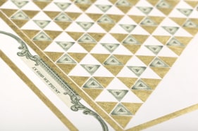 Abdullah M. I. Syed  Illuminated Prisms Manuscript I: Pgs. 1 &amp; 2 (Detail)  2017  Hand-cut U.S. $1 banknotes collage and 24k gold on Illustration board  22.75 x 30 in