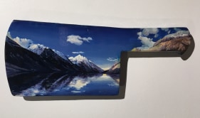 Adeela Suleman  I Will Meet You by the Water - 7, 2017  Metal cleaver with enamel and hardener  5.5 x 12.5 in