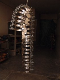 Adeela Suleman REMAINS 2008 Steel drain covers, steel tongs, nuts and bolts 44 x 16 x 18 in.  NFS