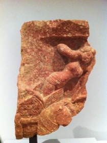 Charioteer Kushan Dinasty Mottled pink sandstone c. 2nd century 11.5 in.