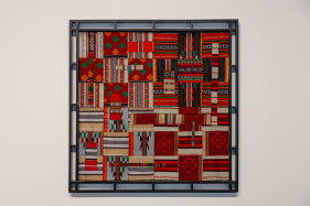 Christopher Joshua Benton  The New Global Economy  Fabric swatches from shuttered upholstery business, wood  42.91h x 42.91w in  Framed: 48.43h x 48.43w in