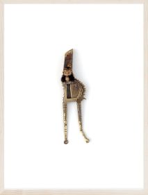 Affan Baghpati  Abbay, 2022  Found objects, brass nut cracker, vinyl head, synthetic hair, copper