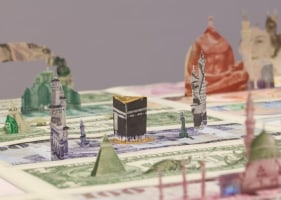 Abdullah M. I. Syed  Moneyscape V: Temenos (Detail)  2017  Hand-cut and assembled various uncirculated banknotes in custom light-box vitrine  22 x 22 x 10 in