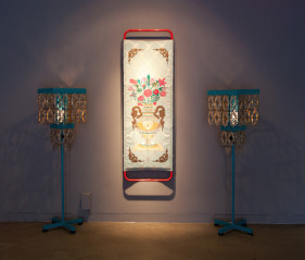 Adeela Suleman  Praying in Her Richly Decorated Room III, 2012  Embroidery on cloth, iron, with powdererd paint and custom lamps  Stretcher: 73 x 23.5 x 5 in. Lamps: 51 x 16 x 16 in.