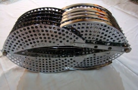 Adeela Suleman DRAINER 1 2009 Electroplated pan drainer, nuts and bolts 13.5 x 3.5 x 6 h in.