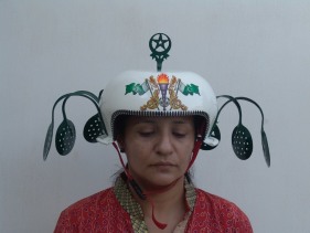 Adeela Suleman, White Helmet with green wings, 2008, Steel cooking utensil, steel spoon, cycle ornament, powder coated and enamel painted, 18 x 13 x 15 in