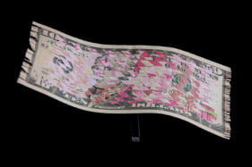 Abdullah M. I. Syed Weaving Myth V (Flying Rug Series) Hand-cut and weaved U.S. $10 bill and 100 Pakistani Rupee with custom Perspex vitrine 6 x 10 in. 2013