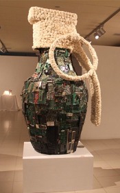 Promotesh Das Pulak PROGRESSION - 1 2014 Electronic components, found objects, Shola flowers and metal frame 48 x 24 x 24 in.