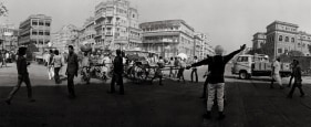 Raghu Rai Directing Traffic in Central Avenue, Kolkata Edition of 10 1990 Digital scan of photographic negative on archival paper 20 x 49 in.