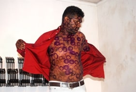 Bandu Manamperi Perforated Body (Performance Still) 2008 C-print on archival paper 30 x 20 in.