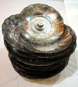 Adeela Suleman STACKED 2009 Electroplated steamers, drain cover, nuts and bolts 14 dia x 14 h in.