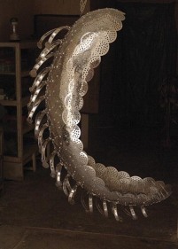 Adeela Suleman ASSEMBLED BONDAGE 2008 Steel drain covers, steel tongs, nuts and bolts 65 x 44 x 27 in.