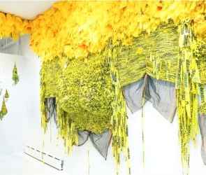 Installation image of Borinquen Gallo hanging sculpture 