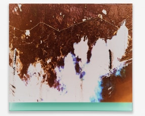 An abstracted photograph with orange, blue, and white, installed on blue plexiglass