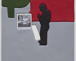 An artwork by Sadie Benning that is gray, red, and green. It depicts a figure's silhouette in black with a small square black and white photograph of a man at his desk with papers around it.