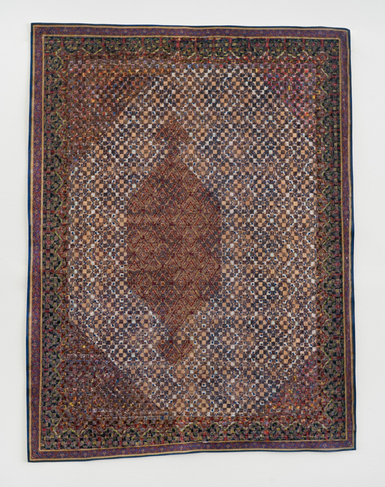 Woven paper artwork reminiscent of an oriental rug and stained glass windows