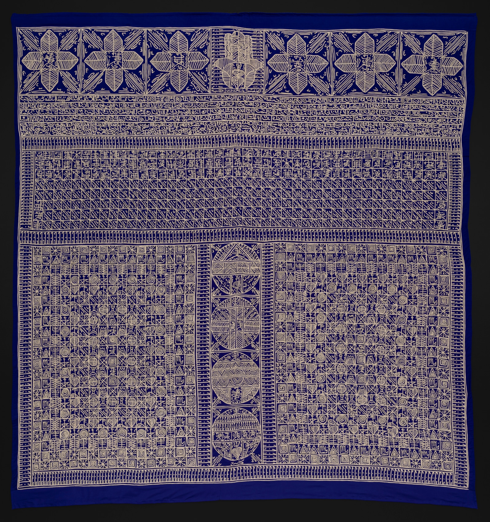 Applique with indigo background and gold intricate graphics