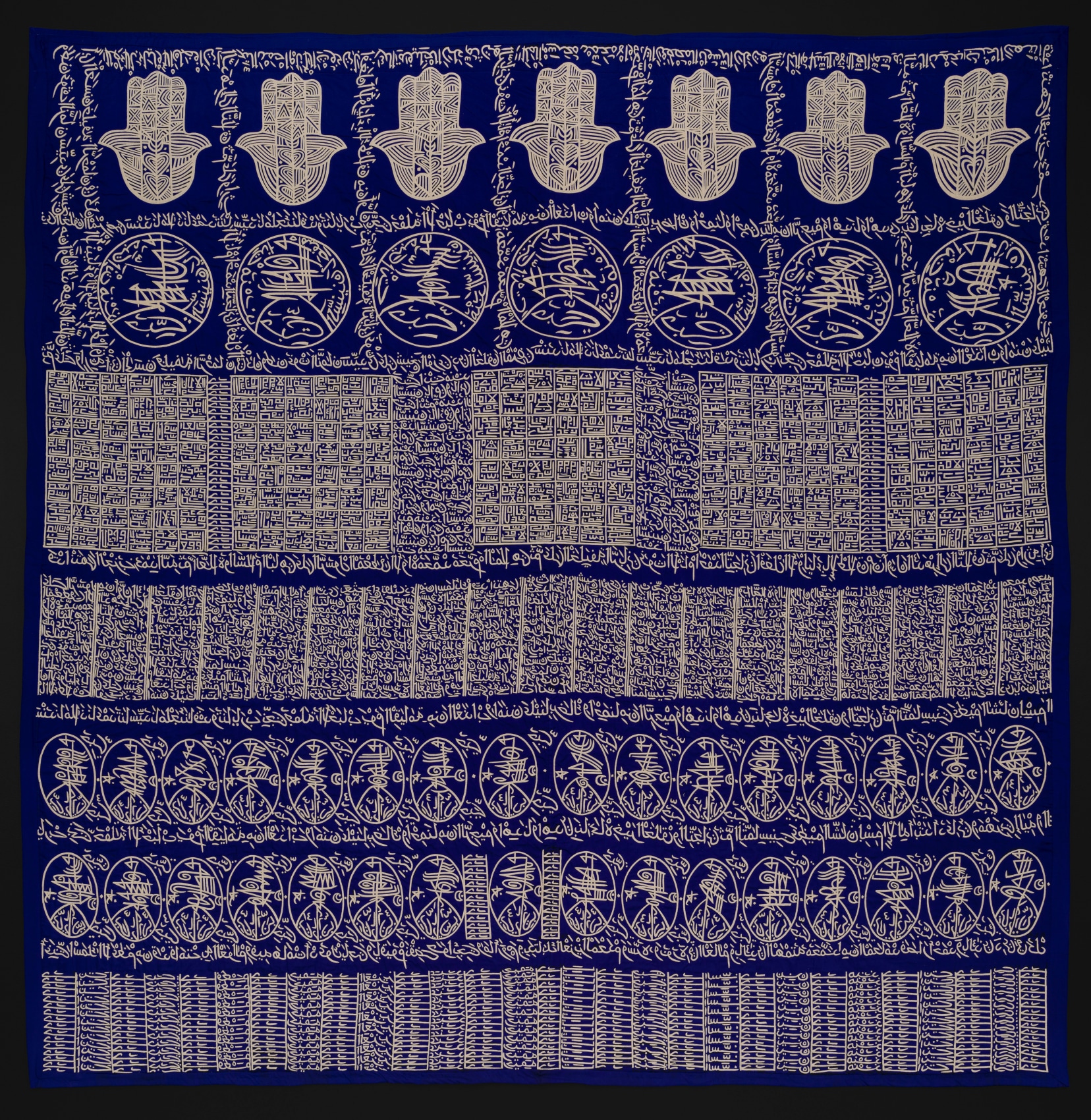 Applique with indigo background and gold intricate graphics
