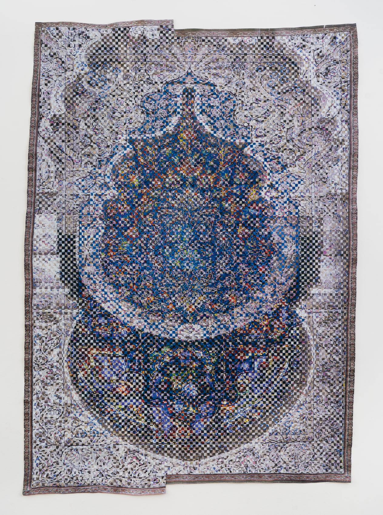 Woven paper artwork reminiscent of an oriental rug and stained glass windows