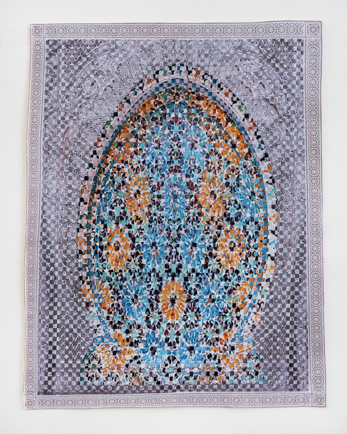 Woven paper artwork reminiscent of an oriental rug and stained glass windows