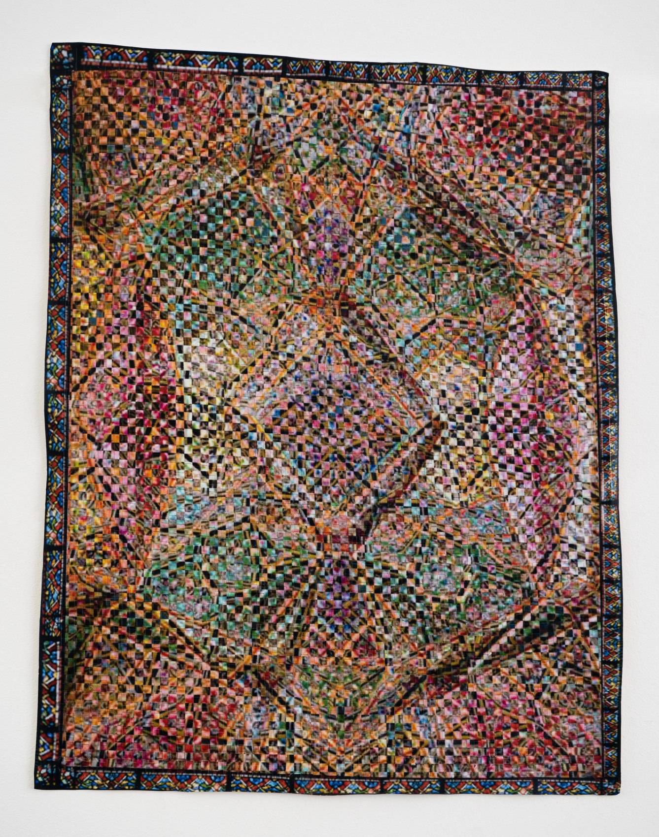 Woven paper artwork reminiscent of an oriental rug and stained glass windows