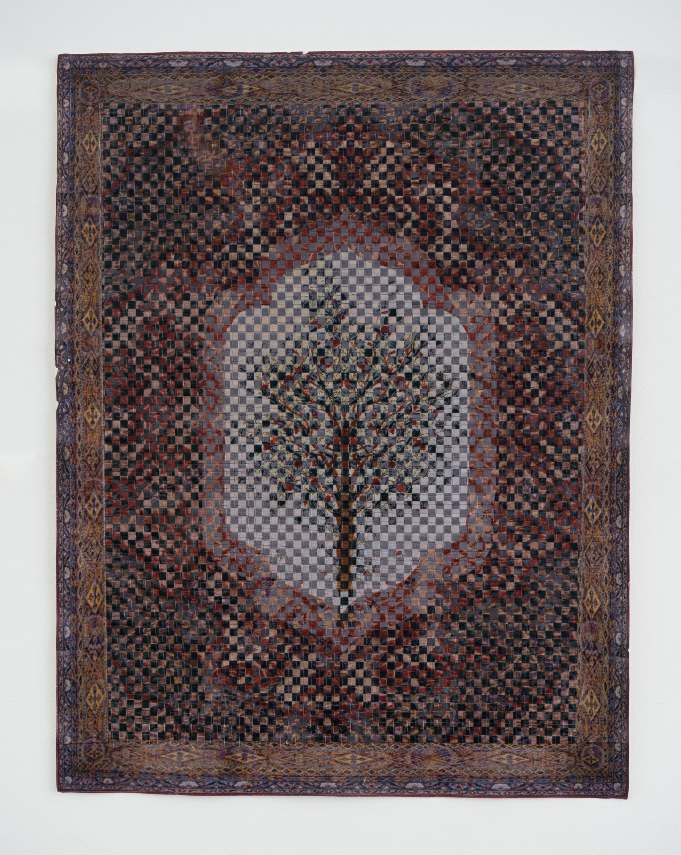 Woven paper artwork reminiscent of an oriental rug and stained glass windows