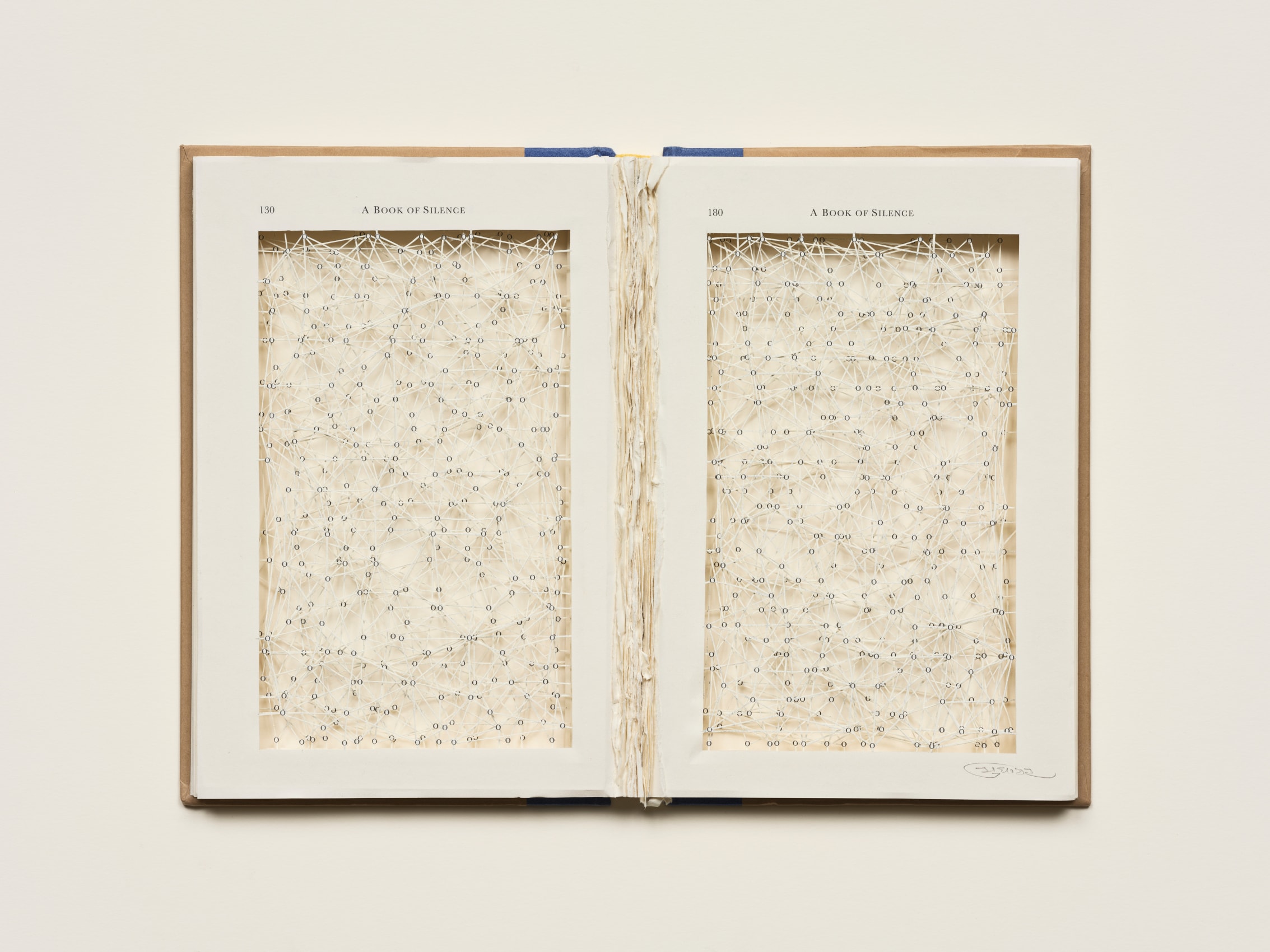 Hand cut, reclaimed book pages