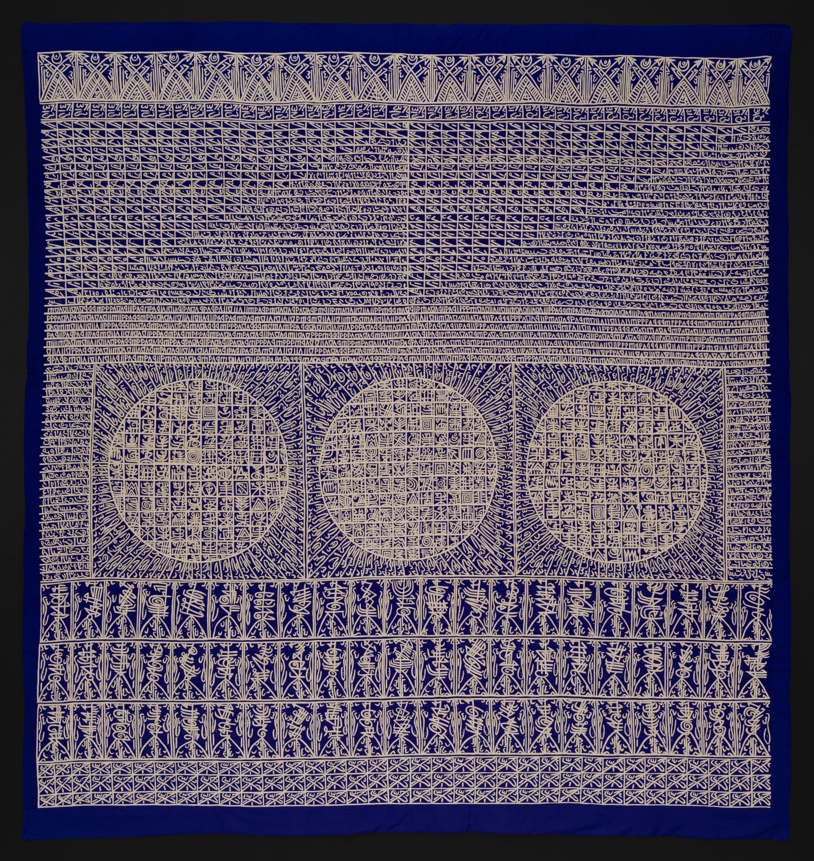 Applique with indigo background and gold intricate graphics